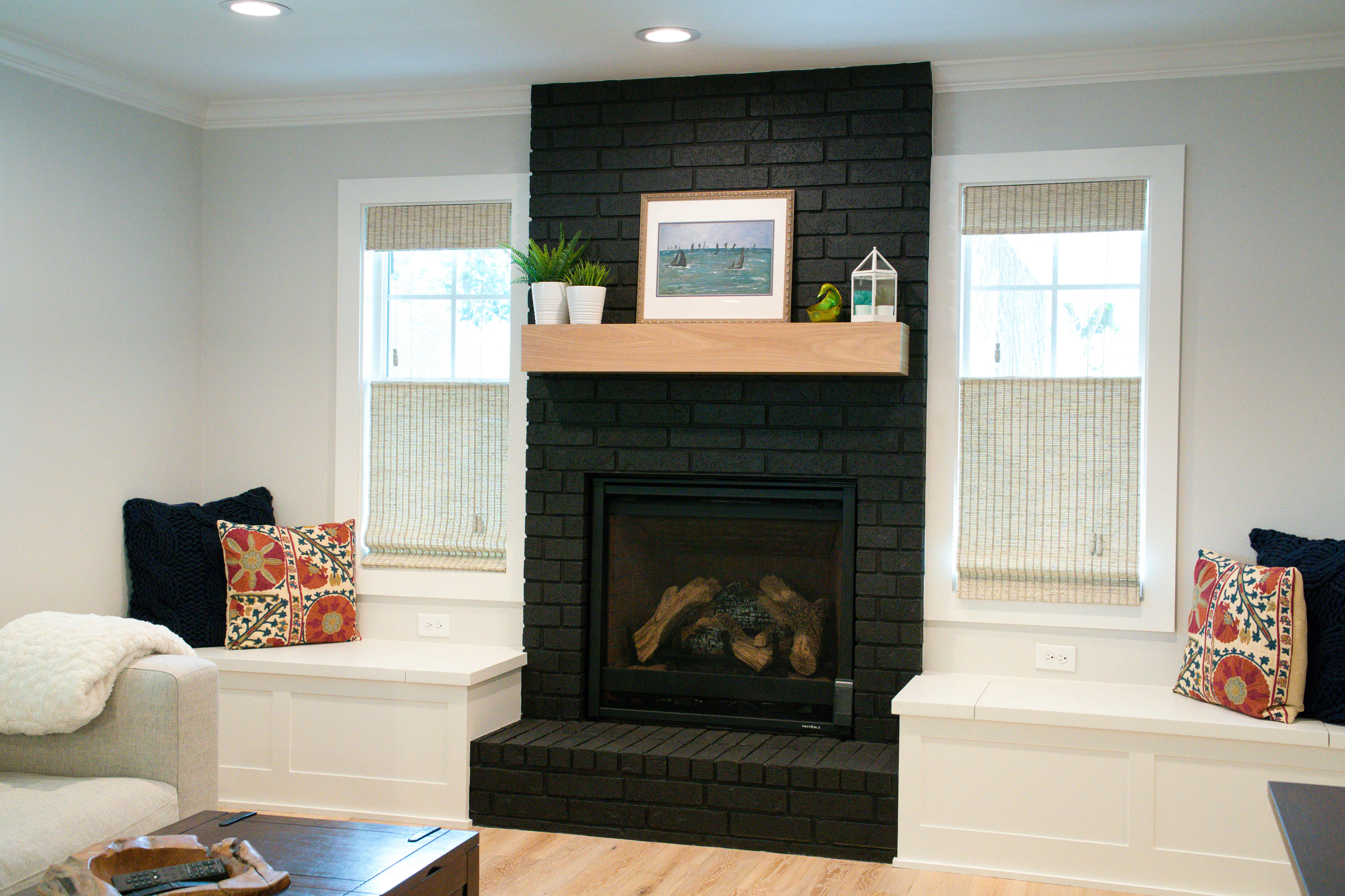 Living room addition with black brick fireplace Houston — Matt Baker Contracting